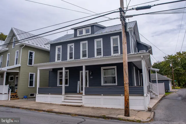 a view of a building on a street