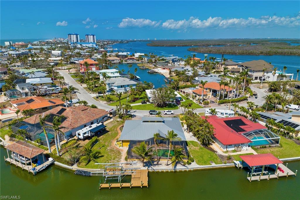 390 Randy Lane Fort Myers Beach, FL 33931 - Photo 18 of 19 an aerial view of residential houses with outdoor space