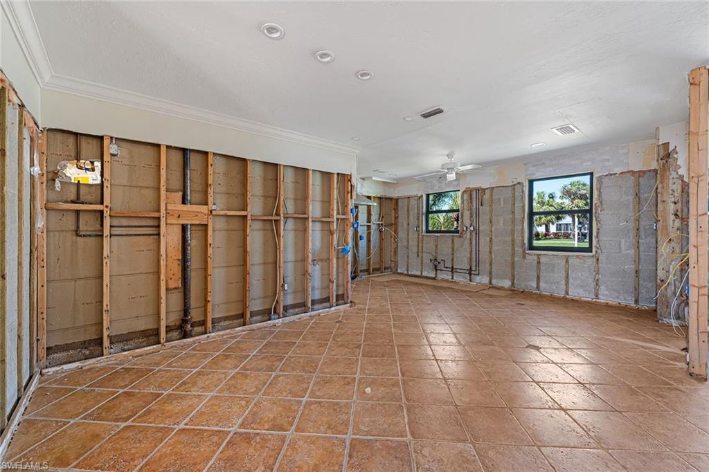 390 Randy Lane Fort Myers Beach, FL 33931 - Photo 5 of 19 a view of an empty room with kitchen