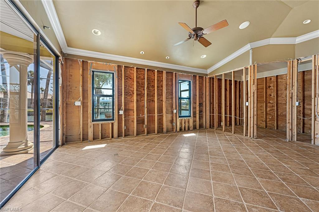 390 Randy Lane Fort Myers Beach, FL 33931 - Photo 7 of 19 a view of an entryway with a chandelier