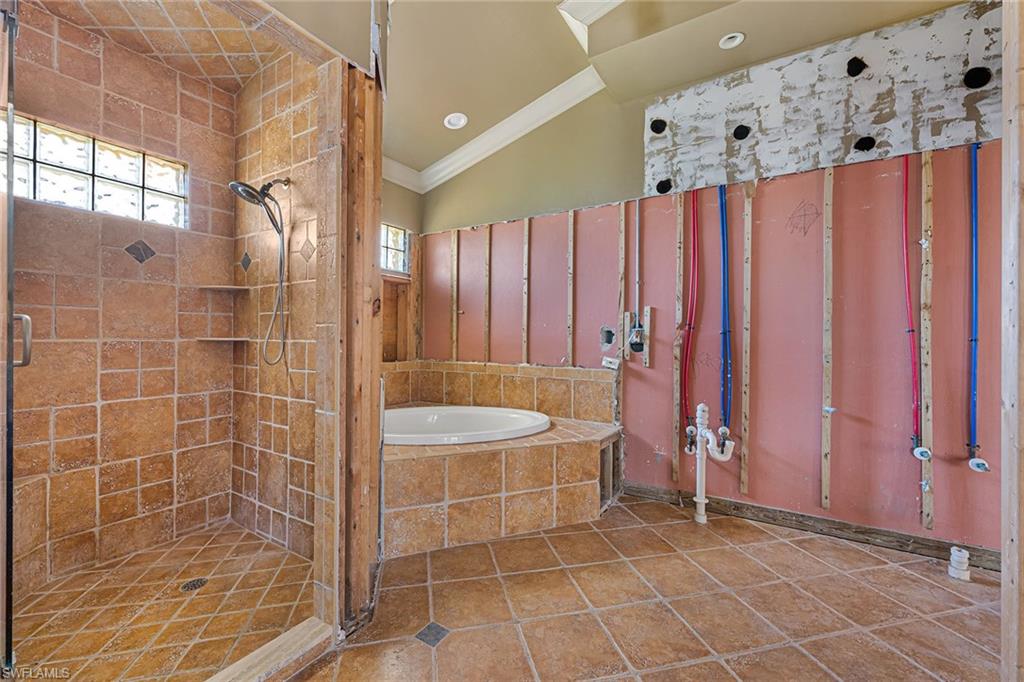 390 Randy Lane Fort Myers Beach, FL 33931 - Photo 8 of 19 a bathroom with a shower