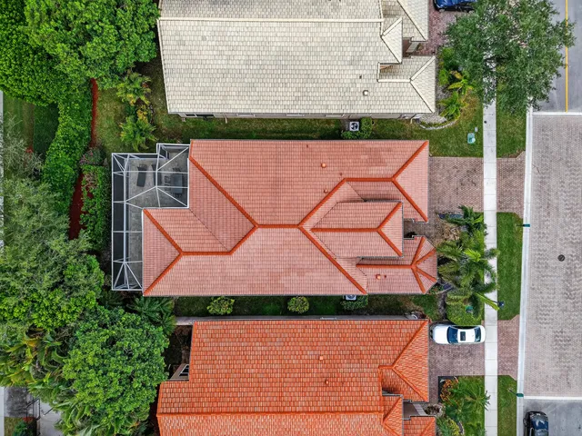 a view of yard with swimming pool and sitting area