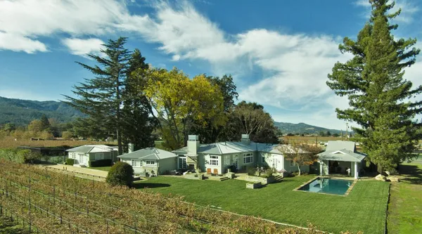 a view of a house with a big yard