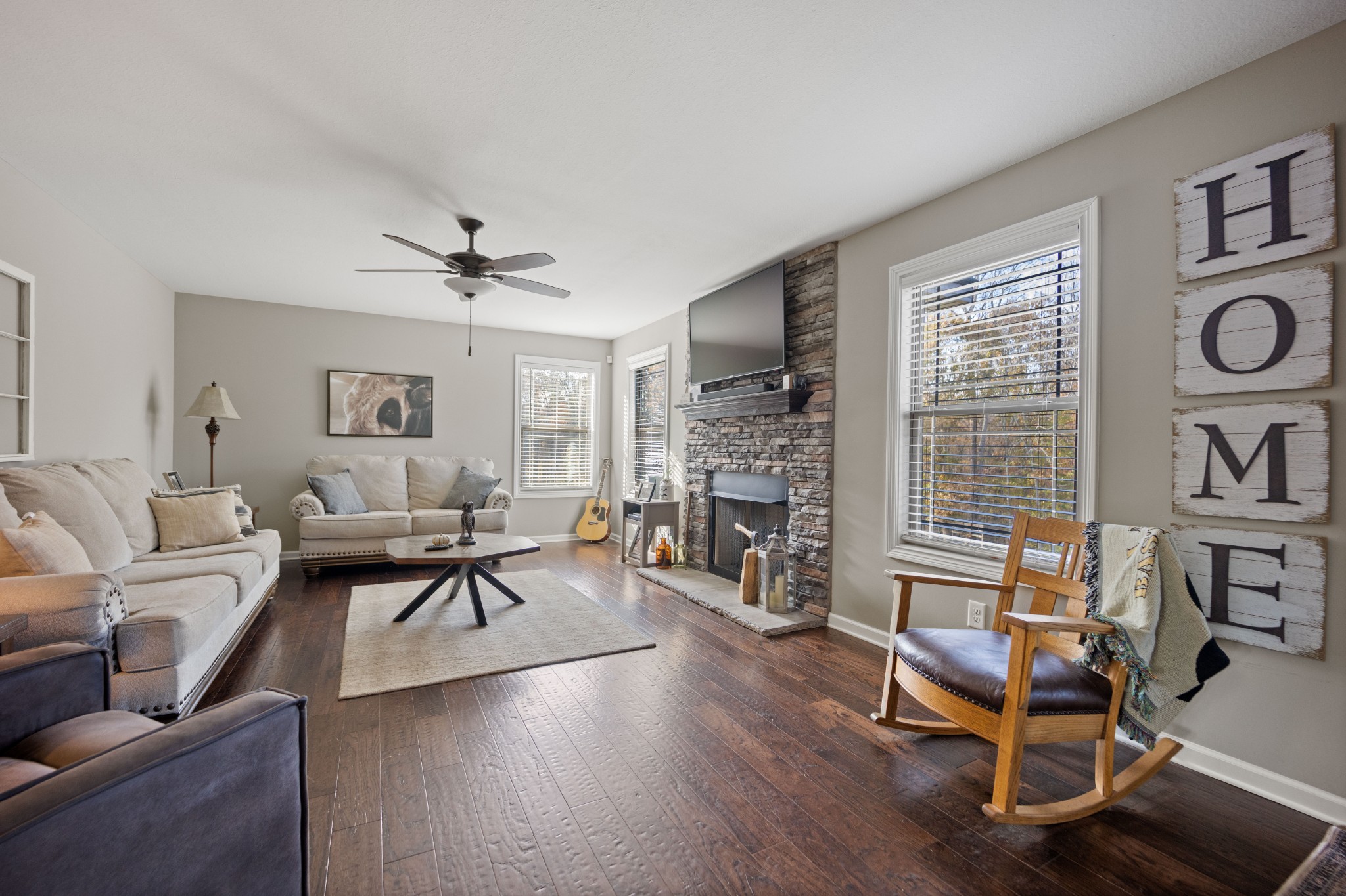 671 Salem Ridge Road Clarksville, TN 37040 - Photo 13 of 44 a living room with furniture a fireplace and a window