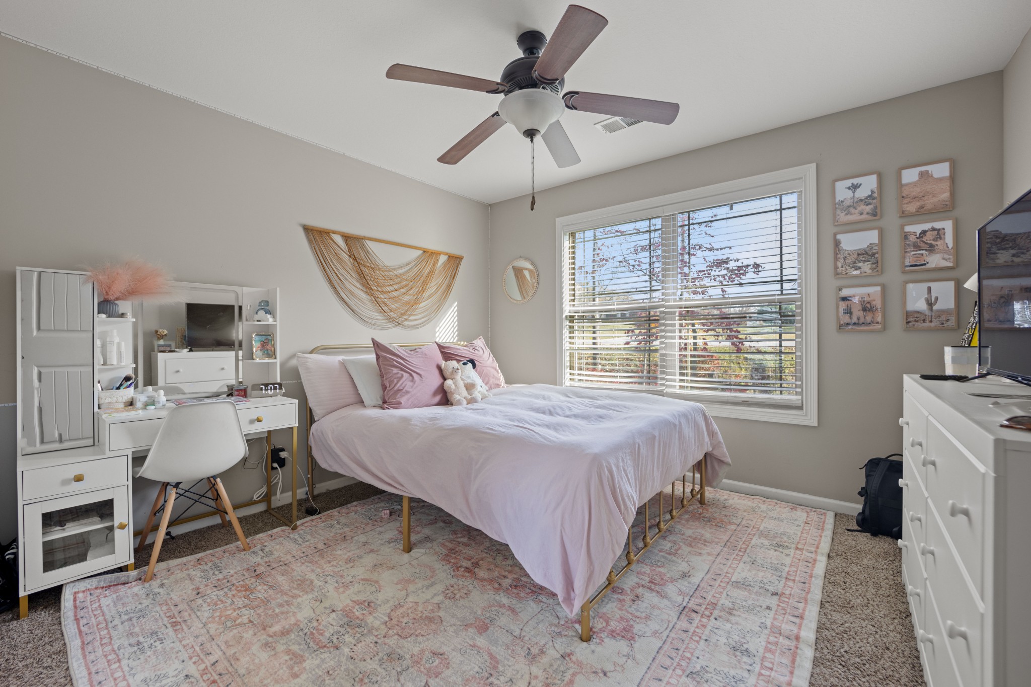 671 Salem Ridge Road Clarksville, TN 37040 - Photo 14 of 42 a bedroom with a bed and a chandelier