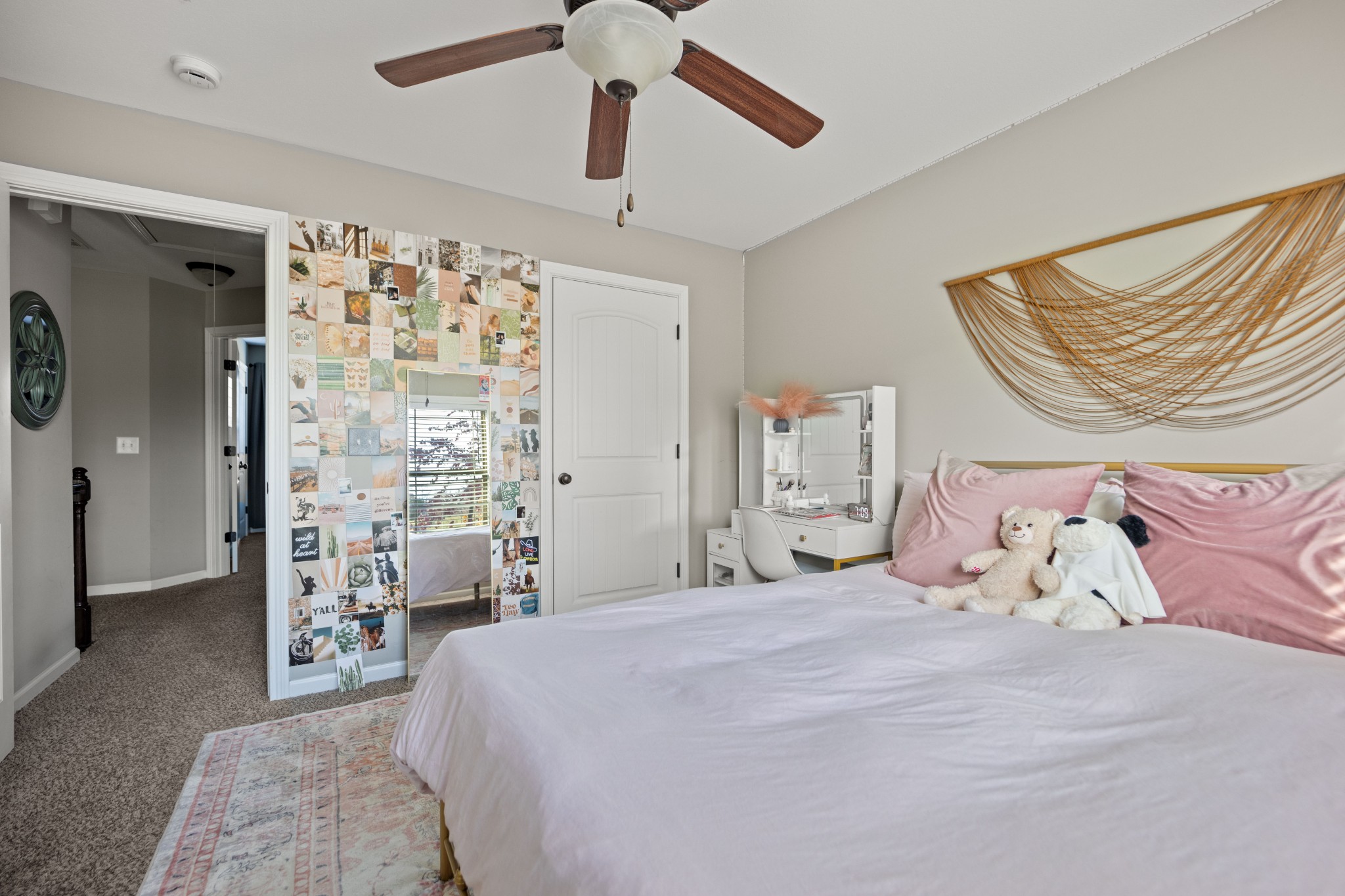 671 Salem Ridge Road Clarksville, TN 37040 - Photo 15 of 42 a bedroom with a bed and a chandelier
