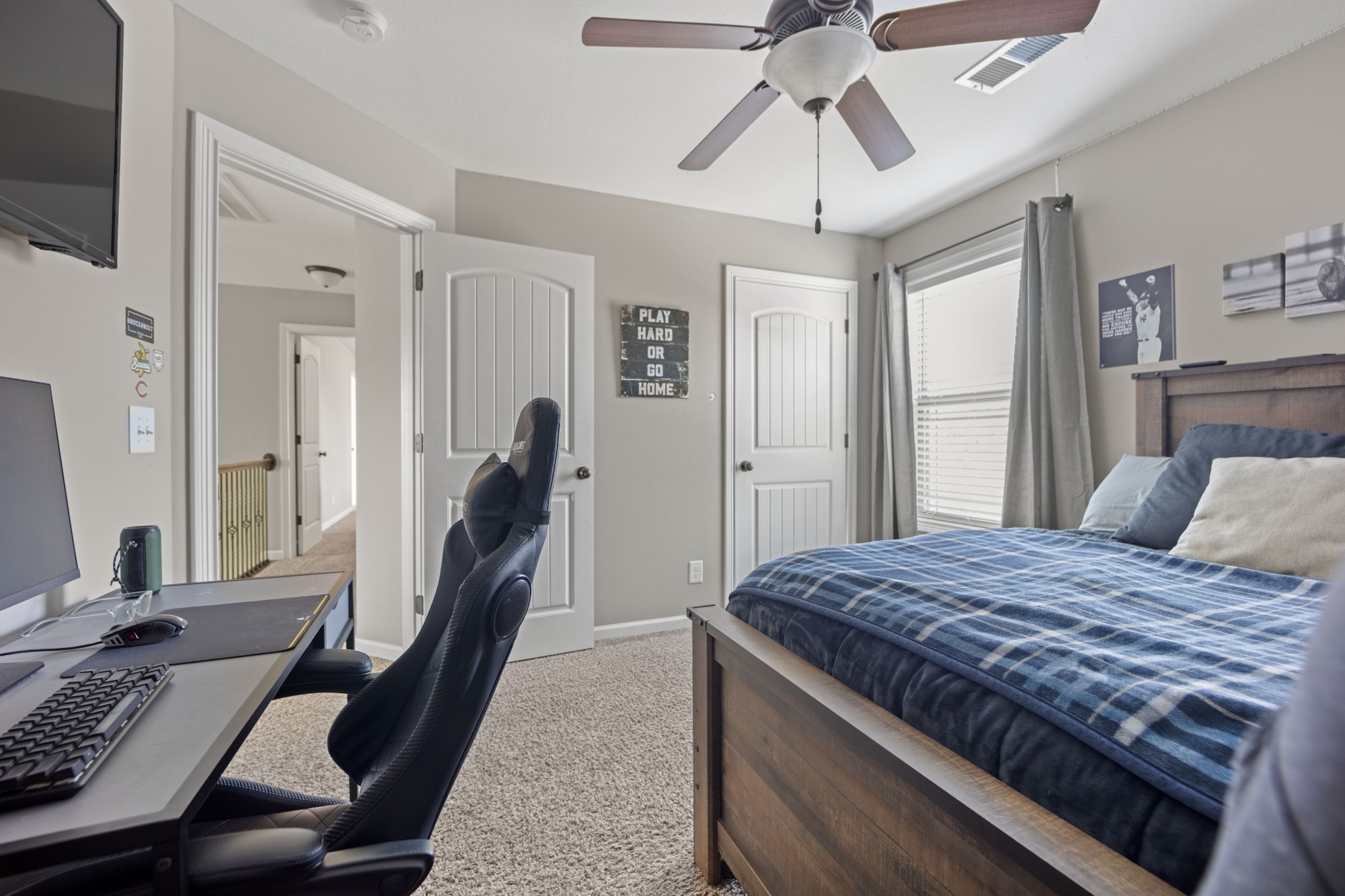 671 Salem Ridge Road Clarksville, TN 37040 - Photo 17 of 42 a bedroom with a bed and a chandelier