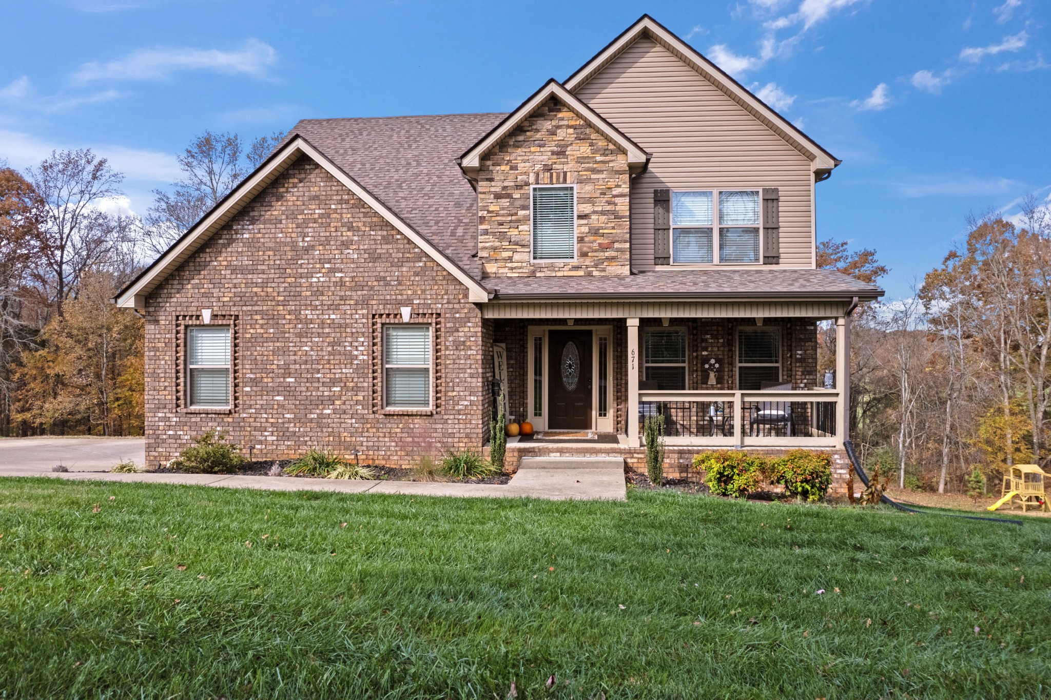 671 Salem Ridge Road Clarksville, TN 37040 - Photo 2 of 44 front view of a house with a yard