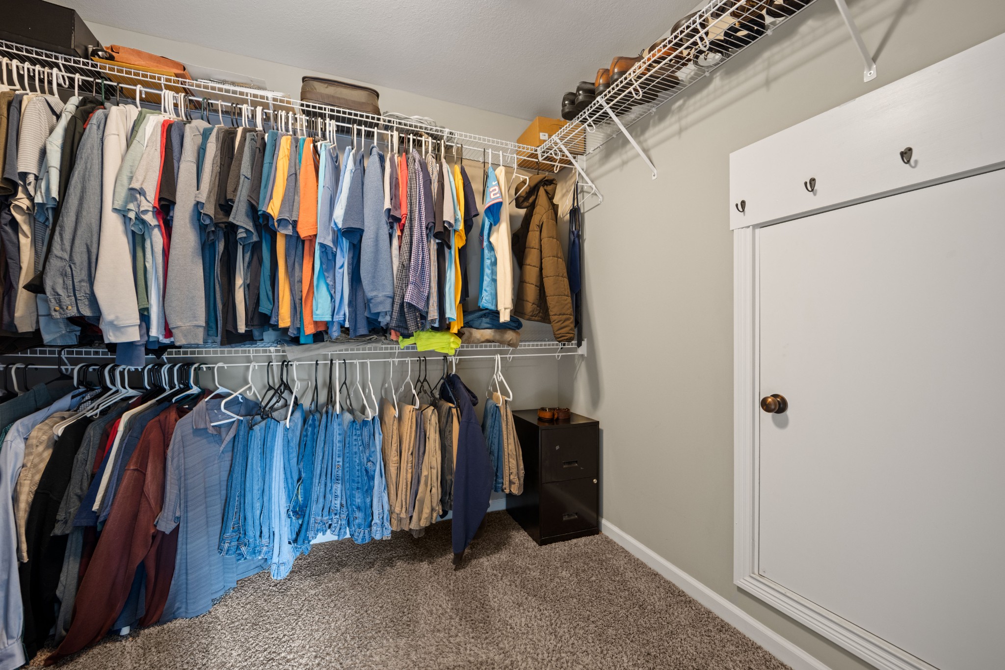 671 Salem Ridge Road Clarksville, TN 37040 - Photo 22 of 42 a view of walk in closet with clothes