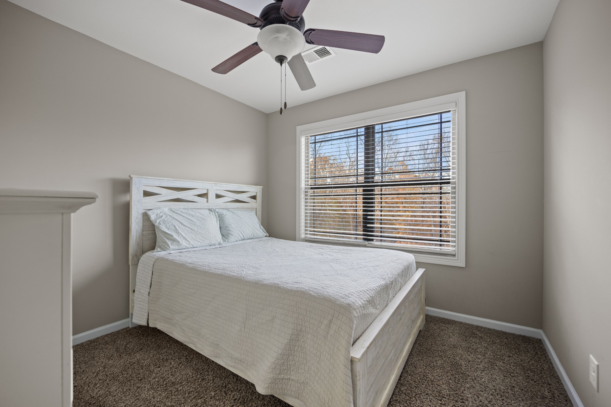 671 Salem Ridge Road Clarksville, TN 37040 - Photo 23 of 42 a bedroom with a bed and a window