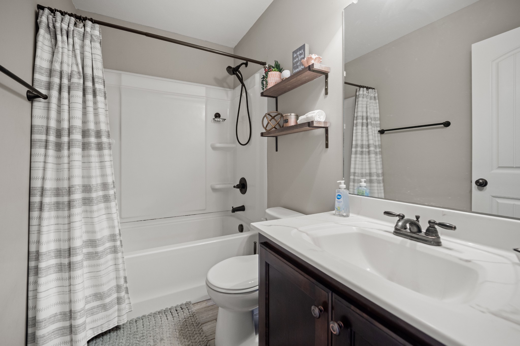 671 Salem Ridge Road Clarksville, TN 37040 - Photo 30 of 44 a bathroom with a sink a toilet and shower
