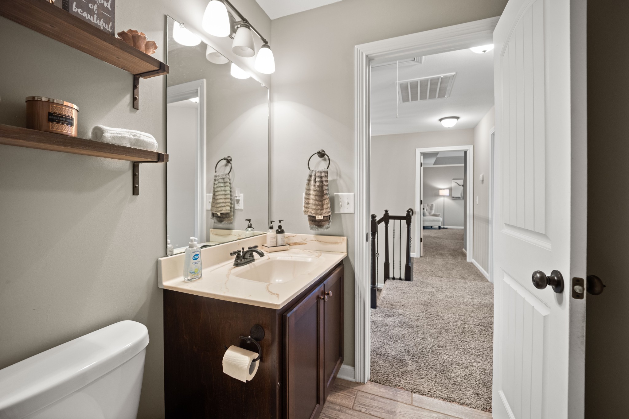 671 Salem Ridge Road Clarksville, TN 37040 - Photo 31 of 44 a spacious bathroom with a toilet sink and mirror