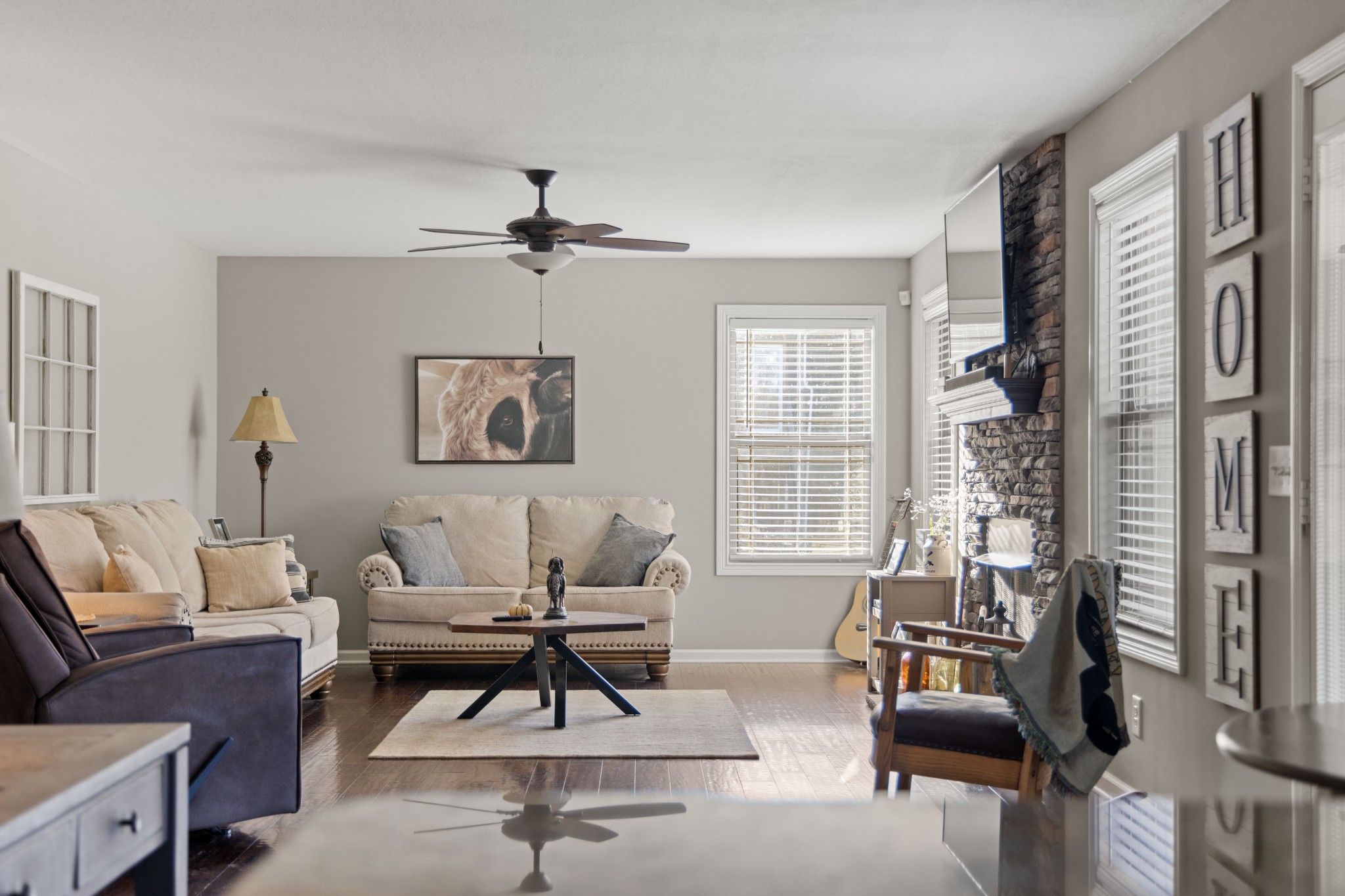 671 Salem Ridge Road Clarksville, TN 37040 - Photo 9 of 42 a living room with furniture a large window and a chandelier