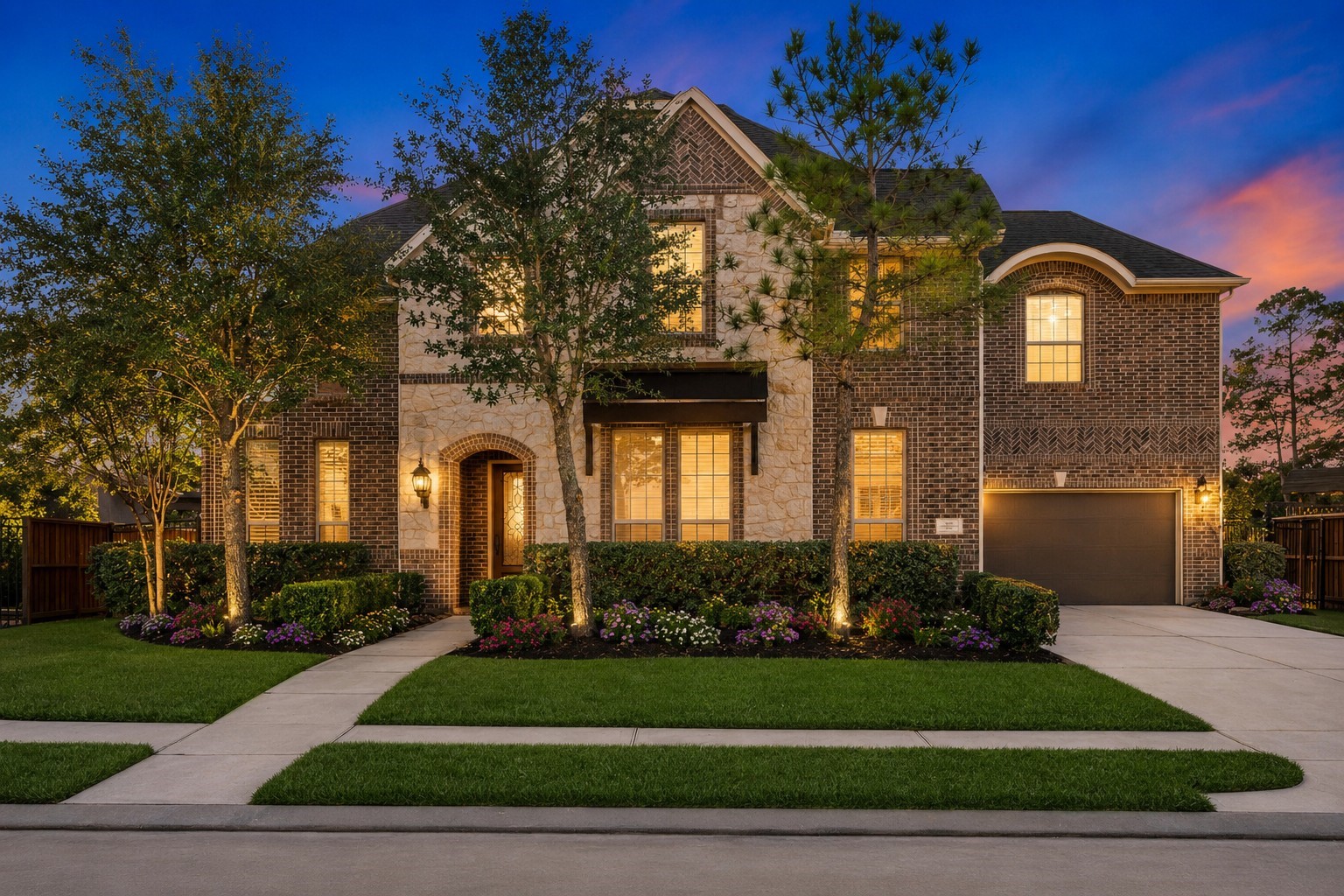 Experience the charm of this Toll Brothers brick-and-stone home on a spacious lot in Woodson’s Reserve. Enhanced by warm lighting and manicured landscaping, it offers exceptional curb appeal and a welcoming presence.