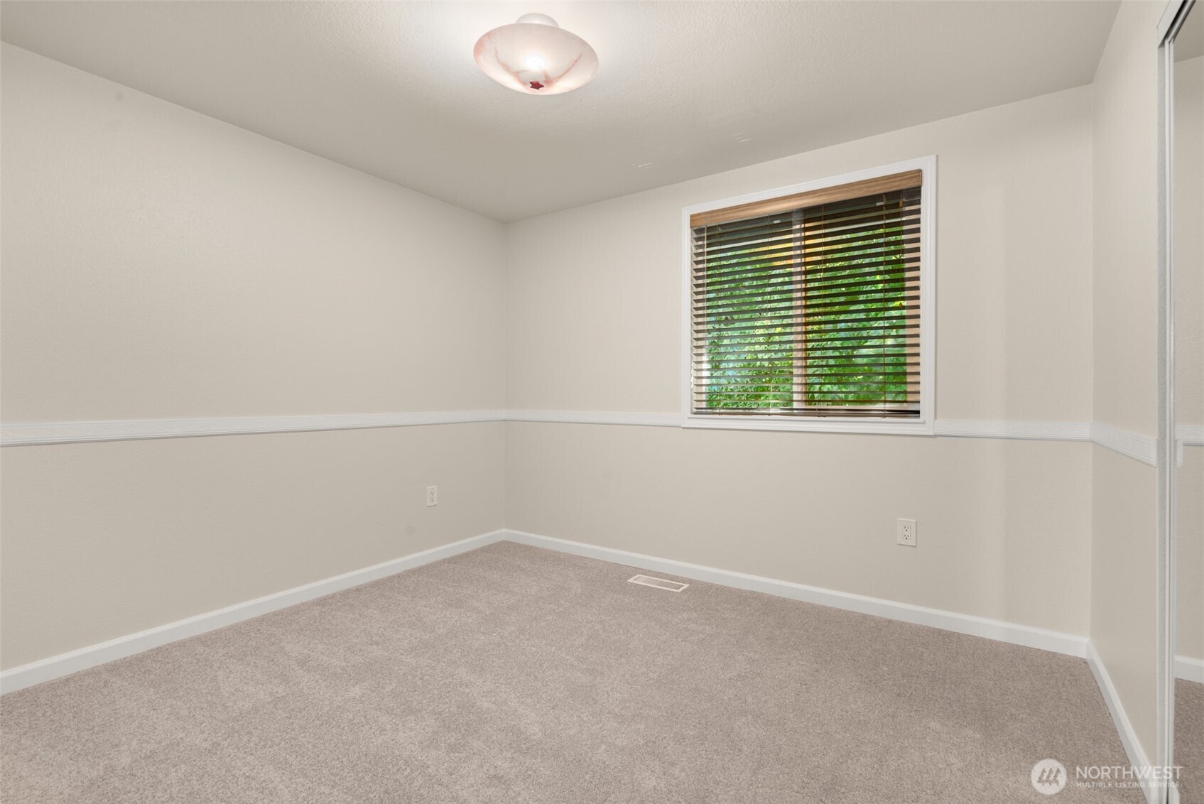13603 Southeast 239th Street Kent, WA 98042 - Photo 13 of 23 an empty room with a window