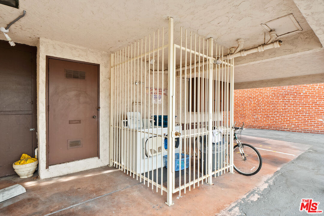 3934 Van Buren Place Culver City, CA 90232 - Photo 12 of 22 a view of a room with floor to ceiling windows and painted walls