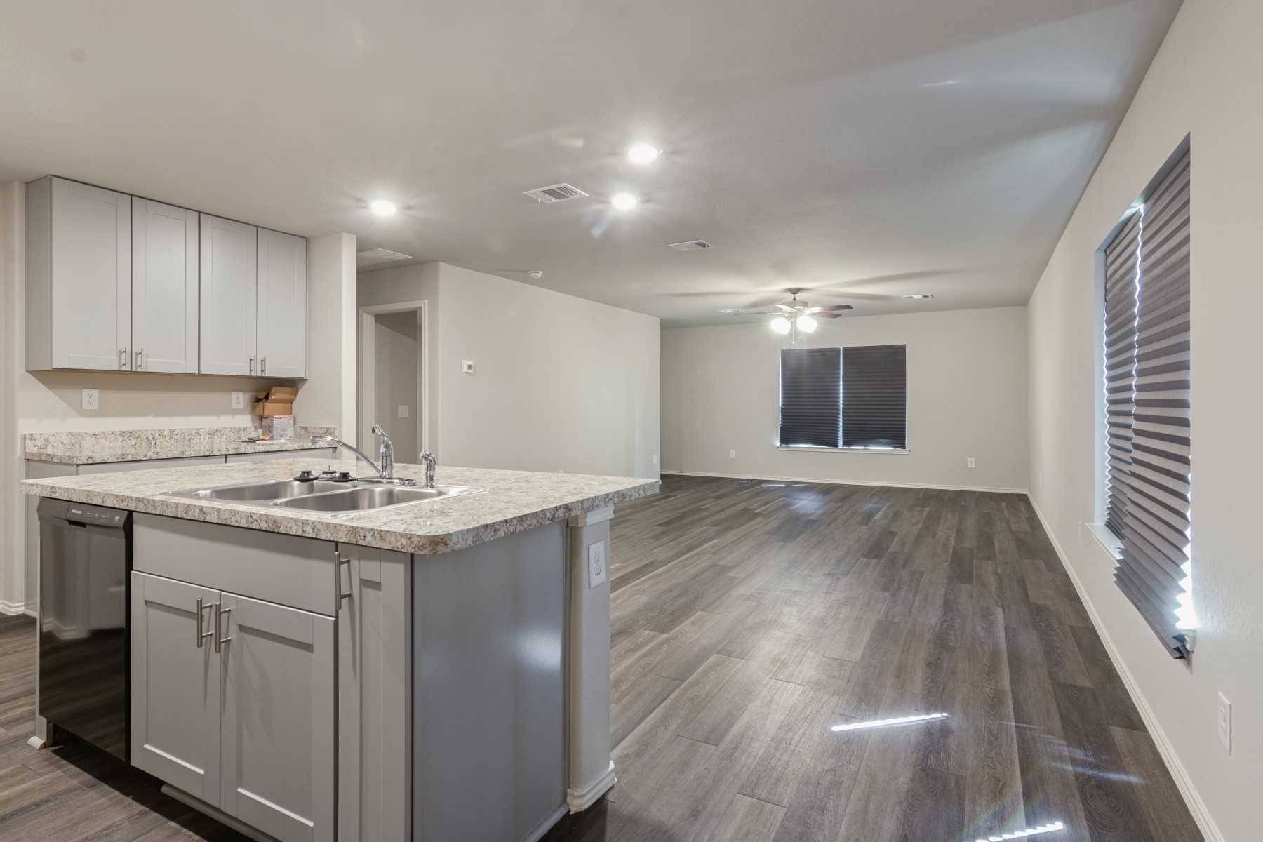 2250 Yelverton Ter Trail Spring, TX 77373 - Photo 7 of 30 a kitchen with a sink and cabinets
