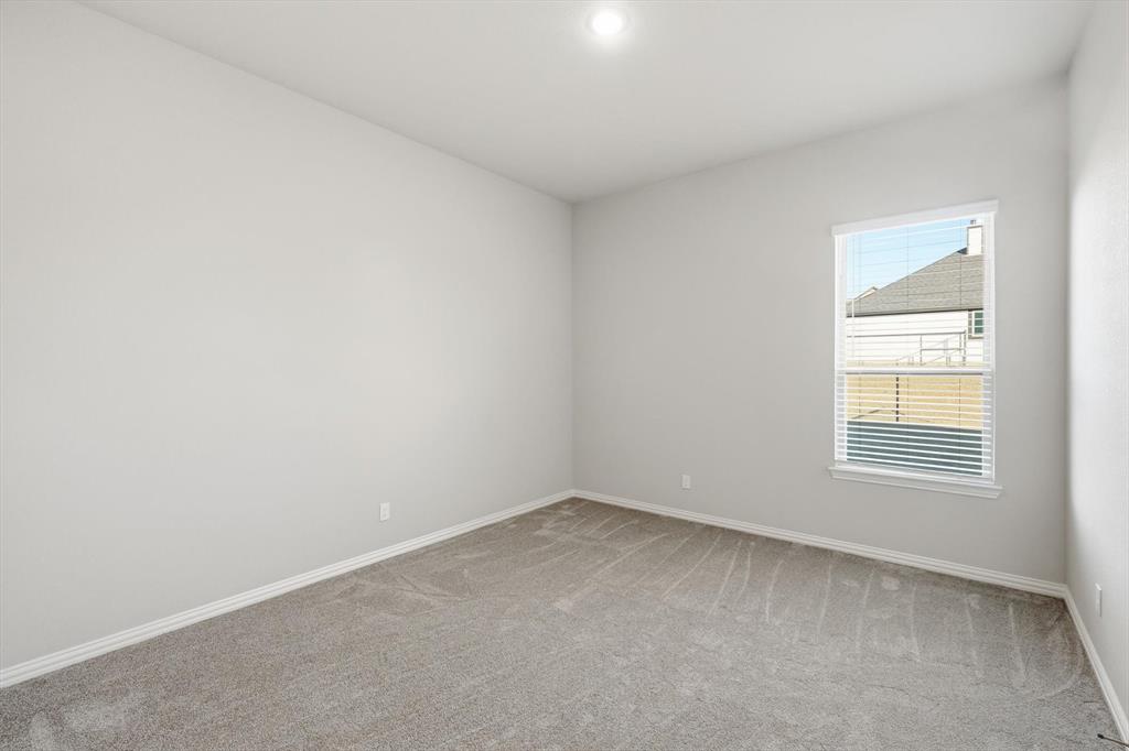 139 Steppes Court Decatur, TX 76234 - Photo 36 of 40 an empty room with a window