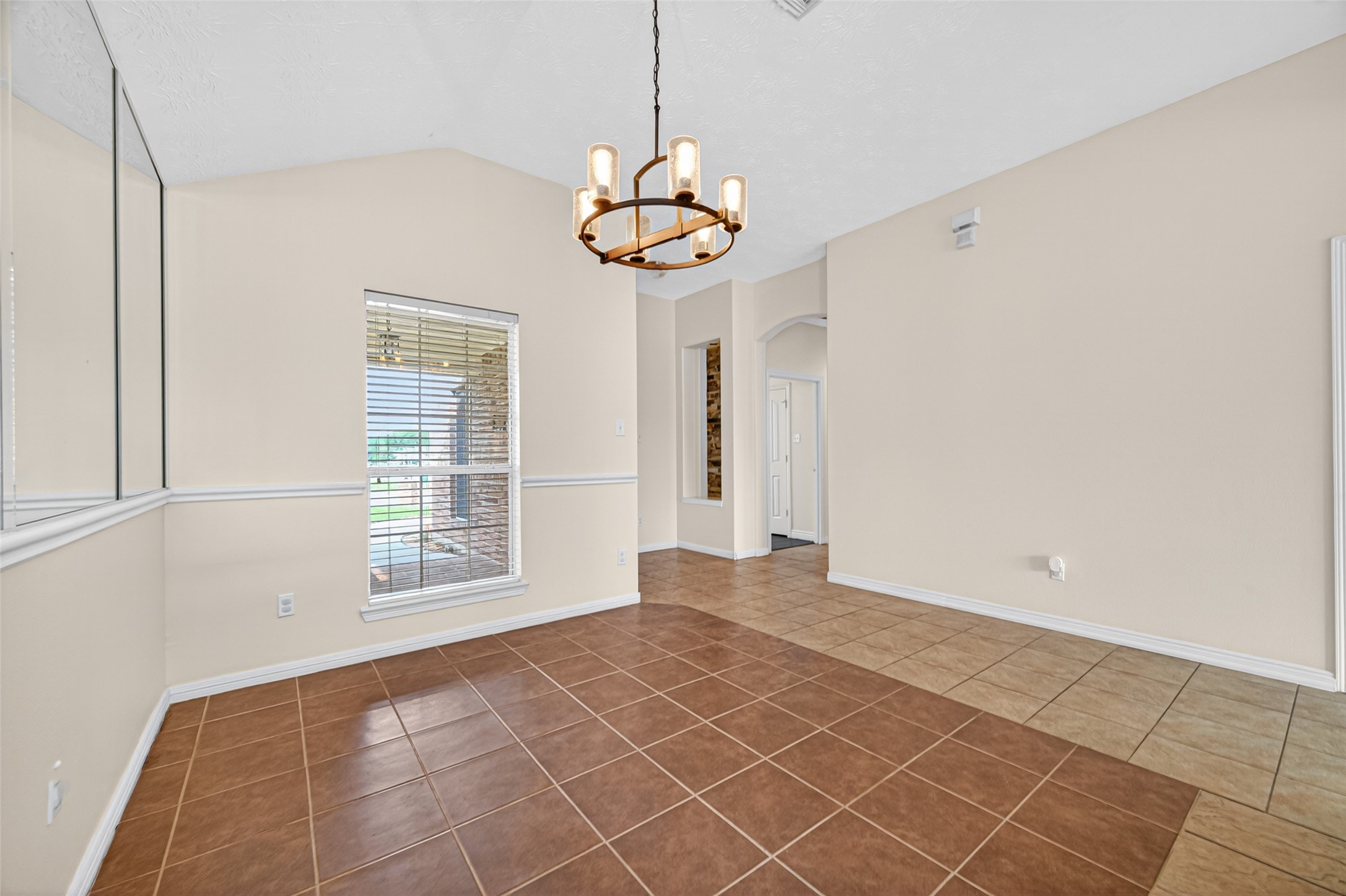 23914 Glengate Drive Spring, TX 77373 - Photo 9 of 49 a view of an empty room with a window