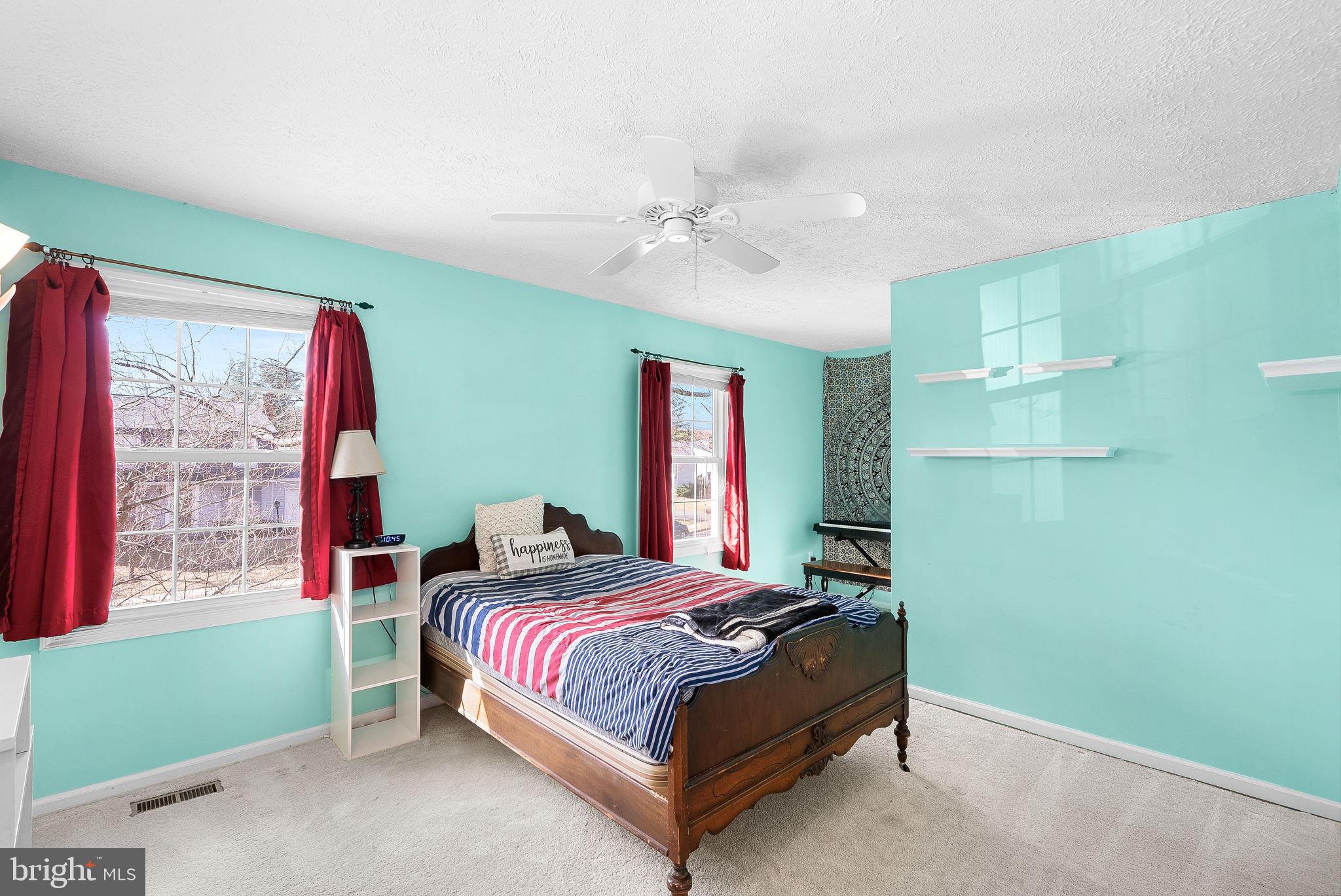 6130 Windward Drive Burke, VA 22015 - Photo 28 of 50 a bedroom with a bed and a window