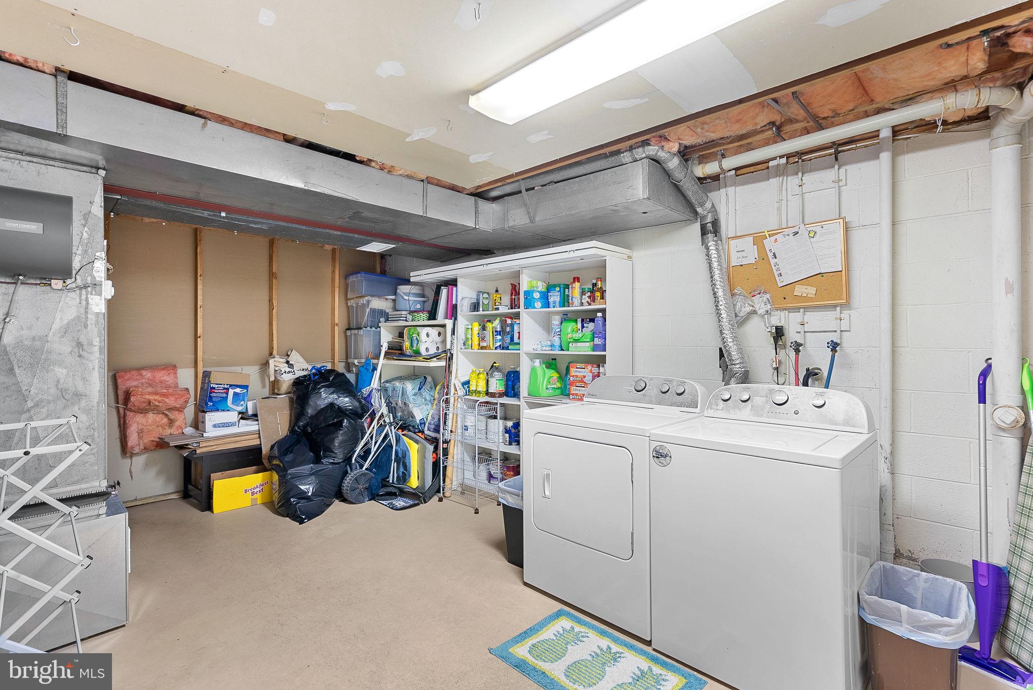 6130 Windward Drive Burke, VA 22015 - Photo 38 of 50 a utility room with dryer and washer