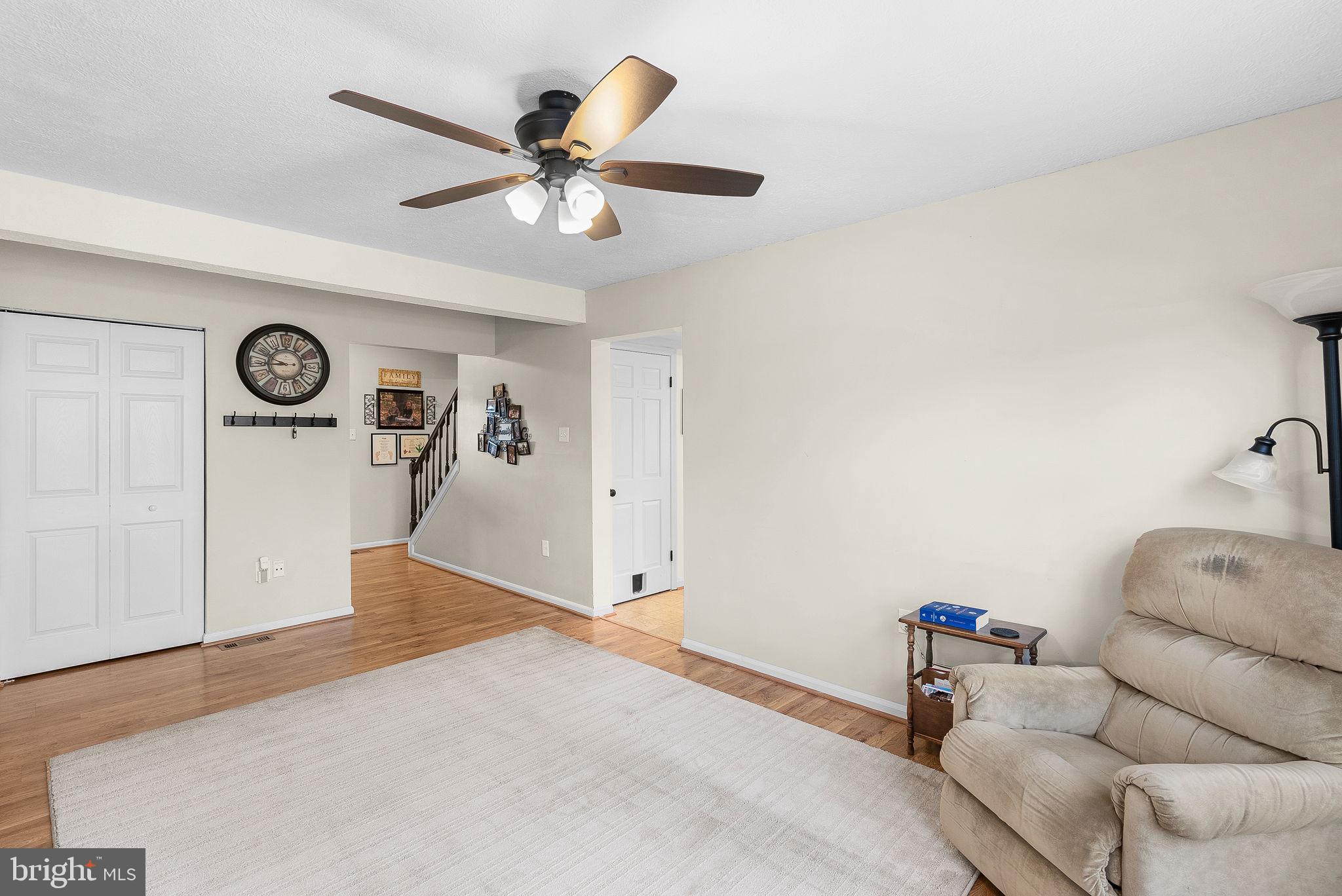 6130 Windward Drive Burke, VA 22015 - Photo 10 of 50 a living room with furniture and white walls
