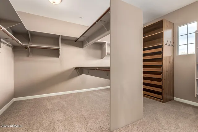 a view of a livingroom with a ceiling fan