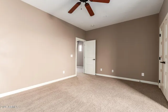 a bathroom with a shower and a toilet