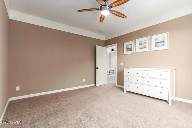 a living room with furniture and windows