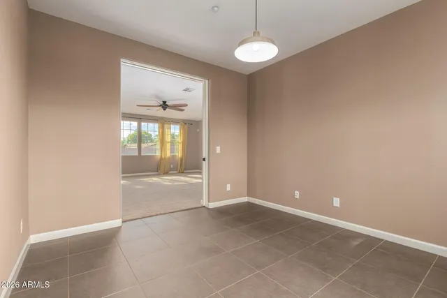 a view of a balcony with wooden floor