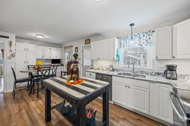 a view of a workspace with furniture
