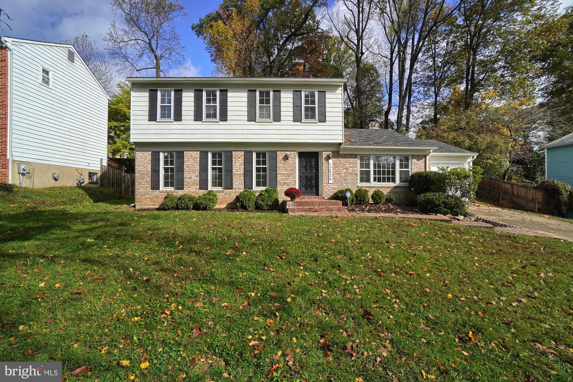 12539 Heurich Road Silver Spring, MD 20902 - Photo 1 of 46 a front view of house with yard and green space