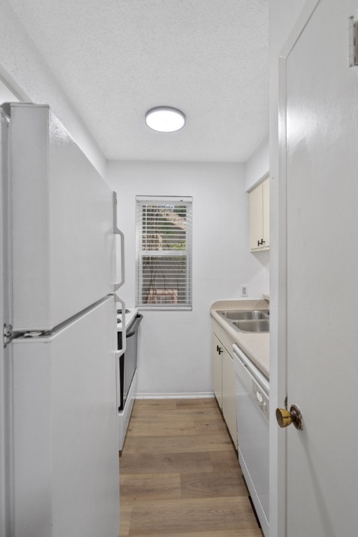 4105 Speedway, Unit 203 Austin, TX 78751 - Photo 2 of 12 a view of a hallway with washer and dryer