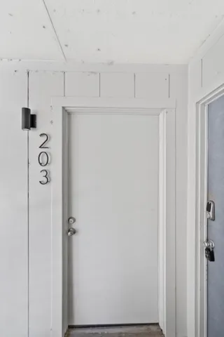 a view of a hallway with closet