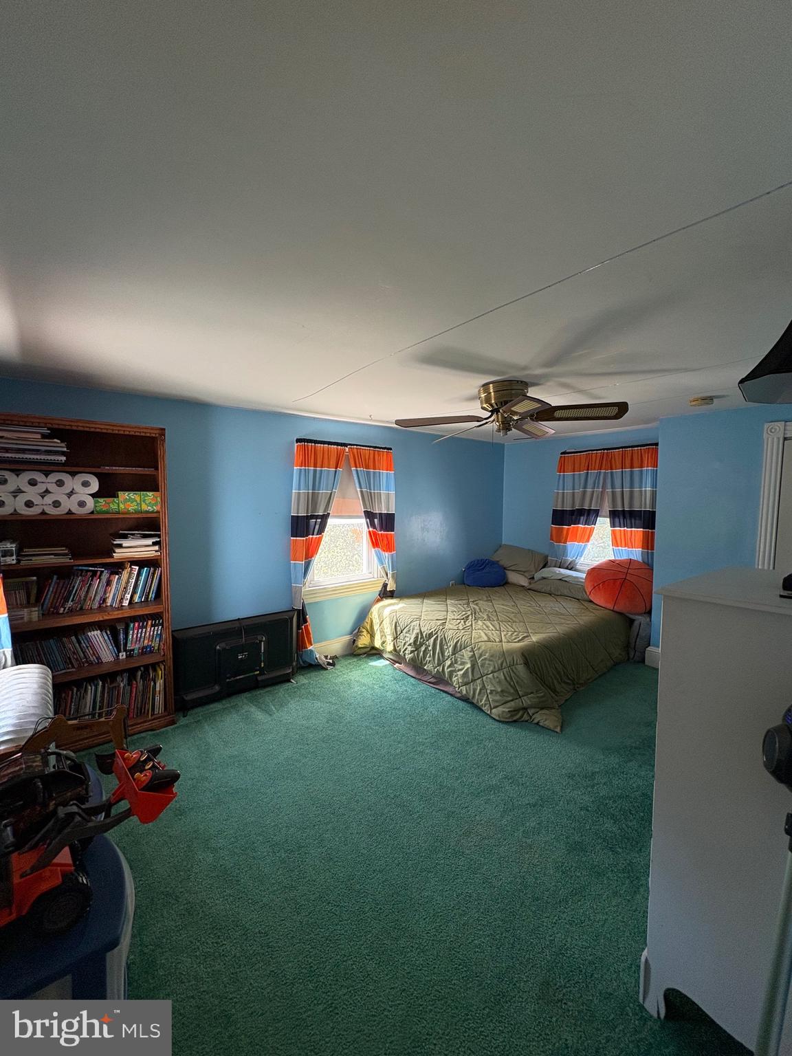 909 Main Street Salem, NJ 08079 - Photo 26 of 35 a bedroom with bed and a bookshelf