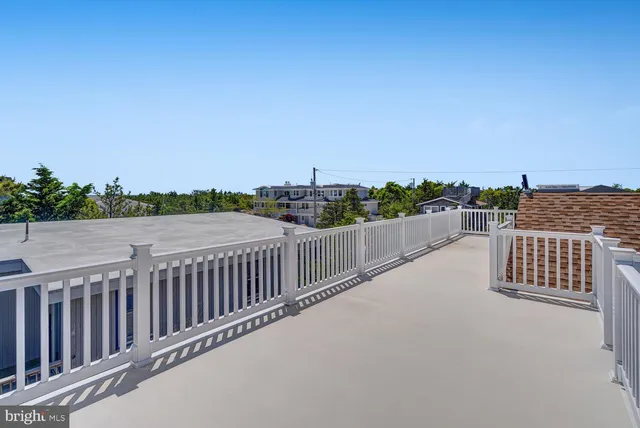 an aerial view of a house with outdoor space