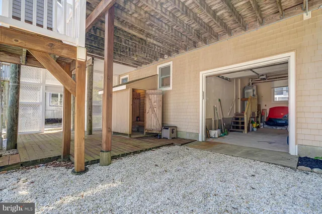 an aerial view of a residential apartment building with a yard