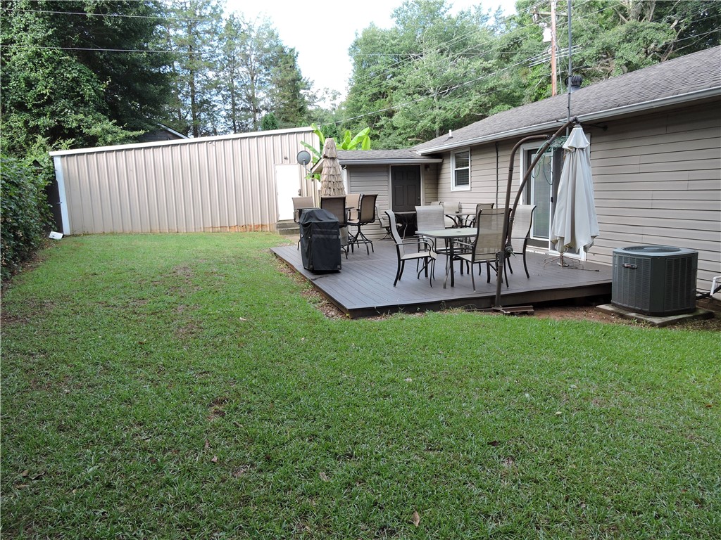 1901 Hattons Ford Road Townville, SC 29689 - Photo 24 of 33 An inviting deck provides an ideal space for outdoor relaxation and entertaining.