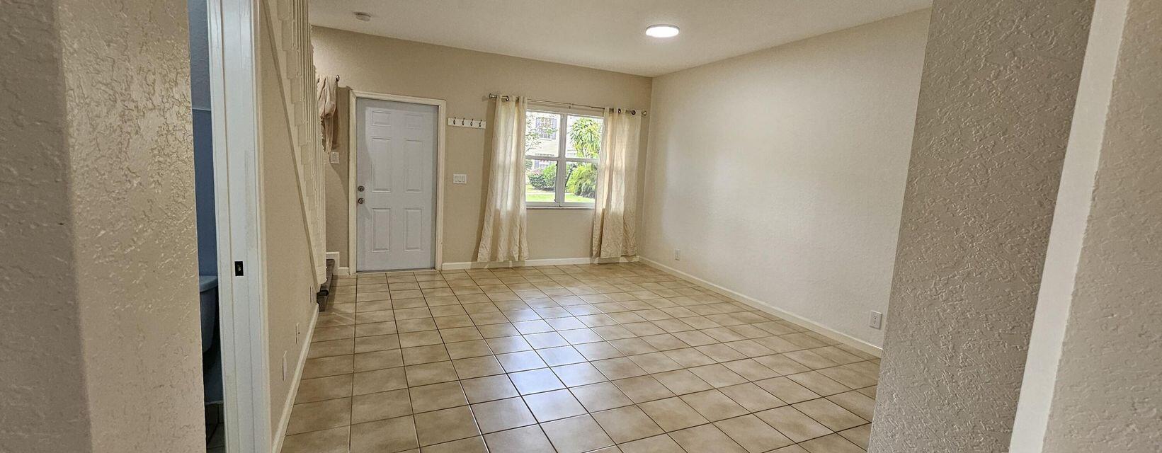 13490 Old Englishtown Road Wellington, FL 33414 - Photo 2 of 13 a view of an empty room and window