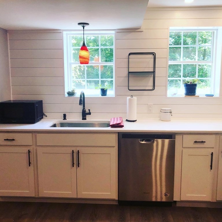 1 Park Road, Unit 1 Sandwich, MA 02644 - Photo 4 of 25 a kitchen with a sink cabinets and window