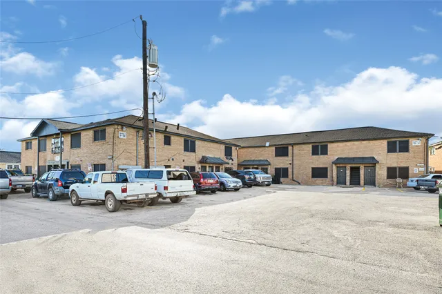 a view of a street with cars
