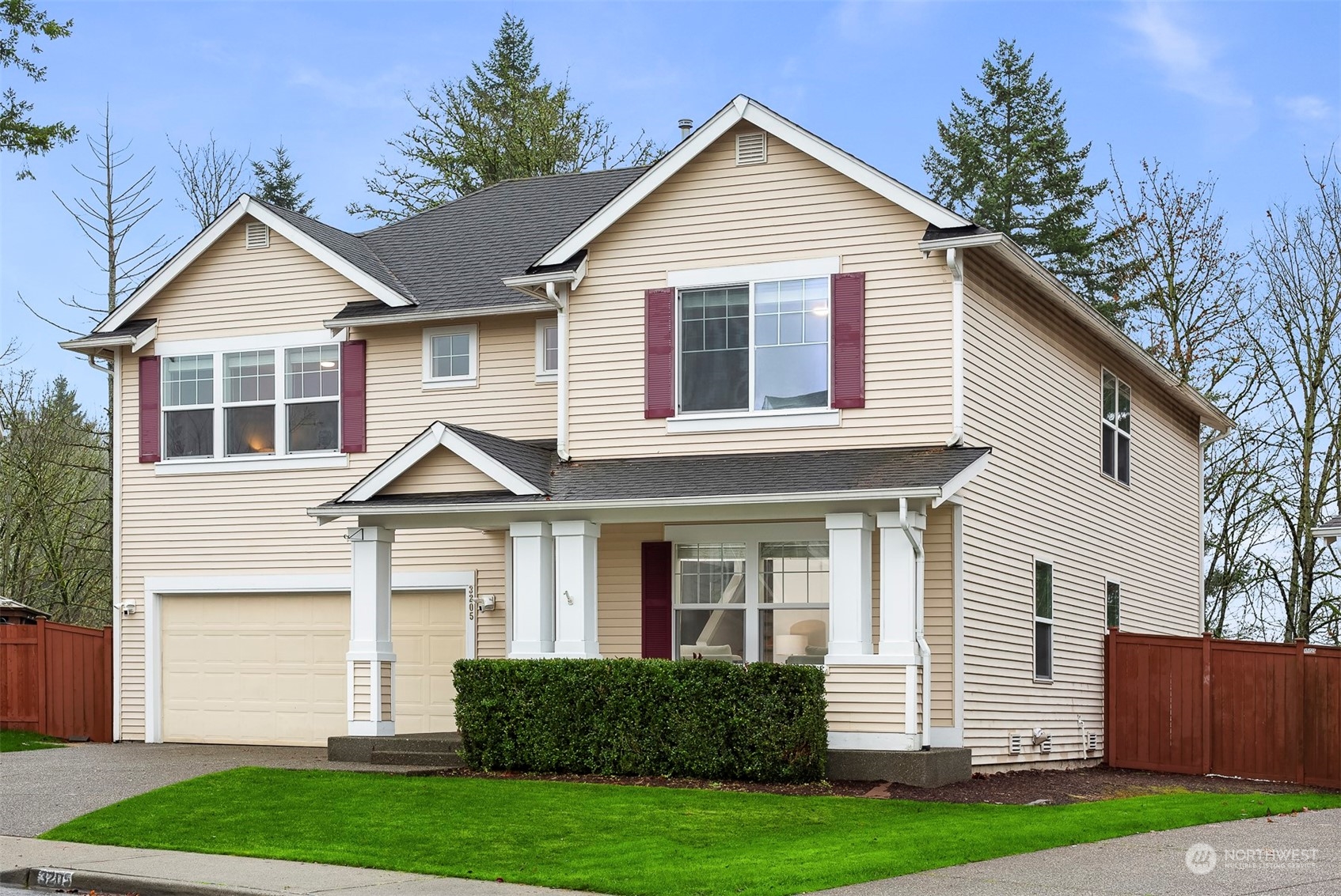 3205 Southeast 4th Street Renton, WA 98056 - Photo 1 of 38 a front view of a house with a yard