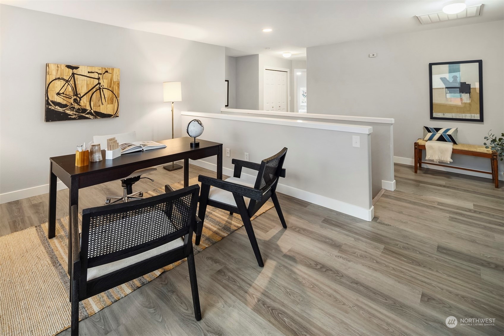 3205 Southeast 4th Street Renton, WA 98056 - Photo 26 of 38 a view of a dining room with furniture and wooden floor
