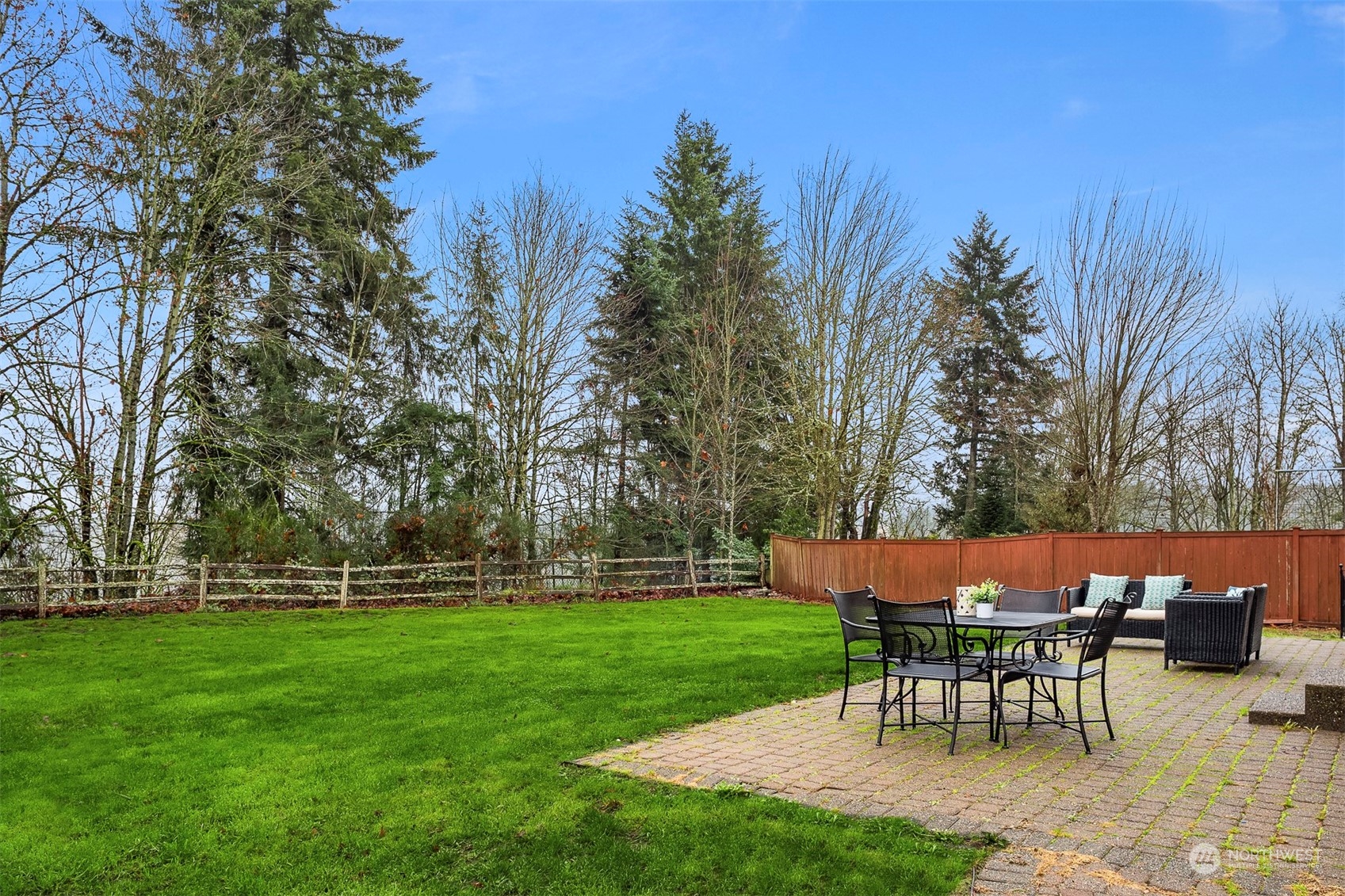 3205 Southeast 4th Street Renton, WA 98056 - Photo 34 of 38 a view of a table and chairs in the garden
