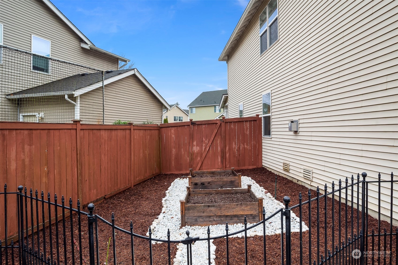 3205 Southeast 4th Street Renton, WA 98056 - Photo 38 of 38 a view of a house with a patio