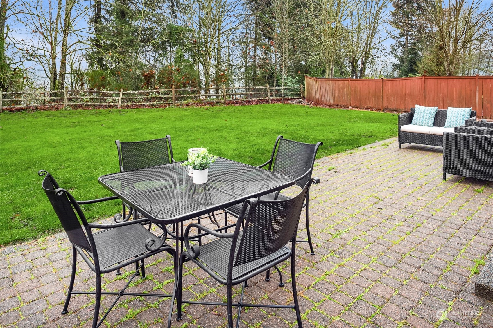 3205 Southeast 4th Street Renton, WA 98056 - Photo 10 of 38 a view of a chairs and table in backyard of the house