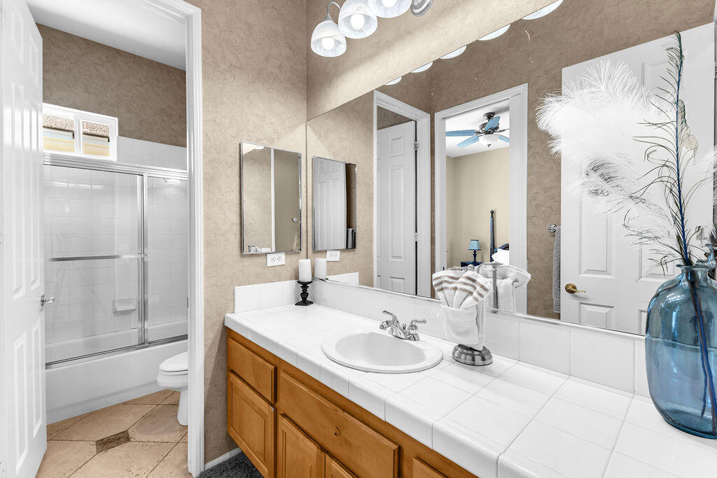 78079 Calle Norte La Quinta, CA 92253 - Photo 31 of 51 a bathroom with a sink and a mirror