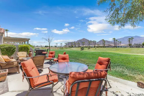 a area with lots of chairs and couches