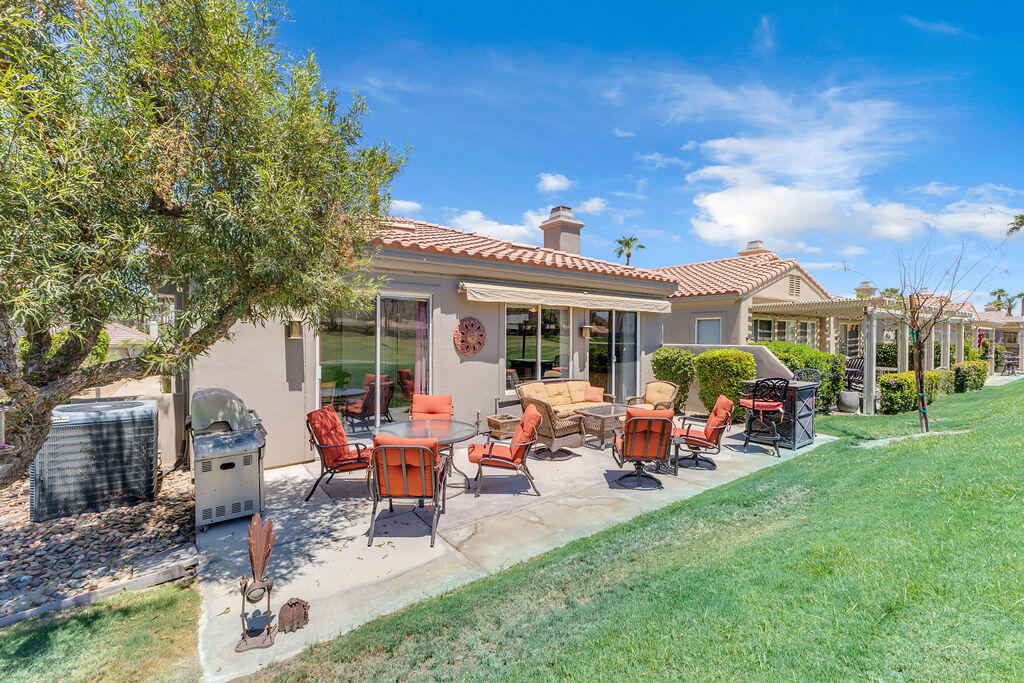 78079 Calle Norte La Quinta, CA 92253 - Photo 35 of 51 a view of a house with sitting area and garden