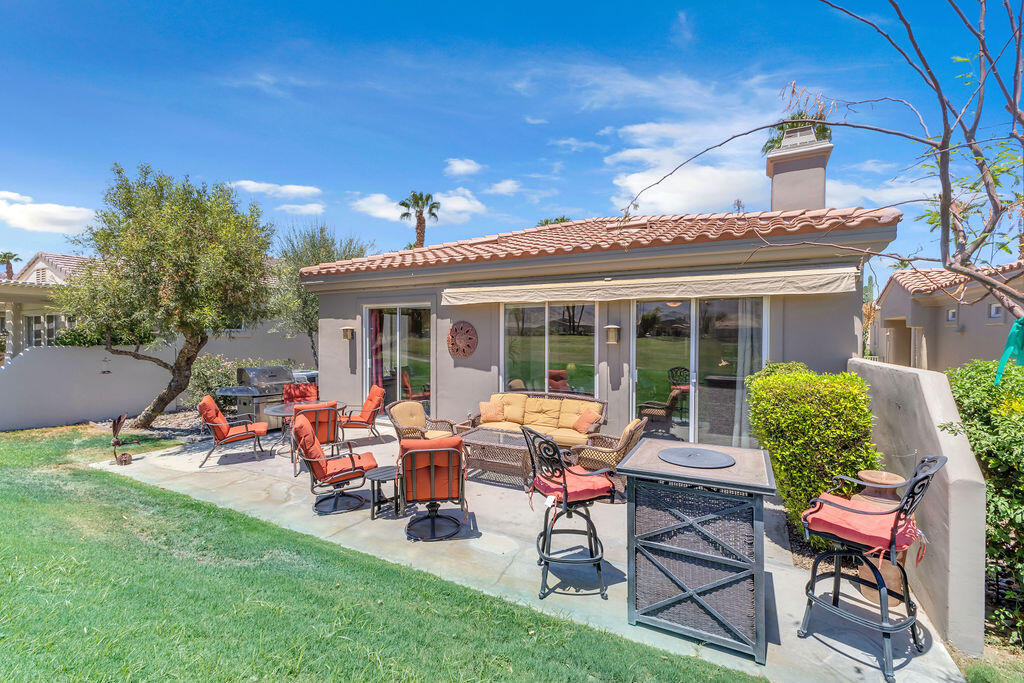 78079 Calle Norte La Quinta, CA 92253 - Photo 36 of 51 a view of a house with backyard sitting area and garden